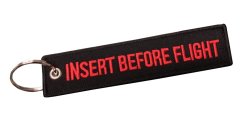 Přívěsek na klíče "Insert before flight"